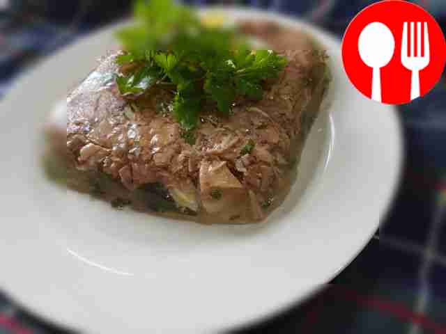 Мясное заливное со свежей зеленью