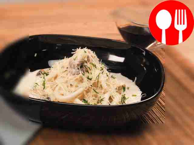 Кальмары в сливочном соусе